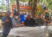 Batuud Koramil 09/Utan Dampingi Penyerahan Mesin Pompa Air untuk Petani Kecamatan Rhee