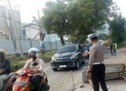 Perbaikan jalan depan BBT, Lantas Polsek Pulomerak Laksanakan Pengaturan Lalulintas,