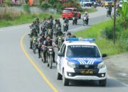 -Polri dan Aparat Terkait Gelar Patroli Show of Force: Ciptakan Kondisi Aman di Tahapan Pilkada Serentak 2024 di Samosir