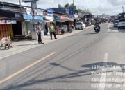 Polsek Timpah Laksanakan Program Hanjewuk Kota Air,  Di Jalan Lintas Palangkaraya Buntok Kecamatan Timpah