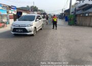 Polsek Timpah Laksanakan Program Hanjewuk Kota Air,  Di Jalan Lintas Palangkaraya Buntok Kecamatan Timpah