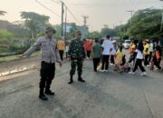 Koramil 1607-06/Lape Amankan Jalan Sehat Peringati Hari Pahlawan dan Sumpah Pemuda