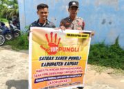 Berikan Edukasi Ke Masyarakat Agar Dapat Memahami Arti Dan Pidana Pungutan liar (Pungli) Polsek Kapuas Barat Lakukan Sosialisasi Satgas Saber Pungli