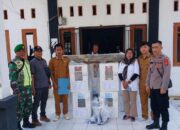 Anggota Polsek Rangkasbitung Polres Lebak Pengamanan Logistik Pilkada 2024 Di Kantor Desa Pabuaran