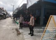 Piket Polsek Kapuas tengah bersama piket  lakukan patroli ke pasar harian Pujon