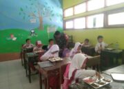 Tingkatkan Gizi Anak Sekolah, TNI dan SPPG Bersinergi di Kecamatan Lunyuk