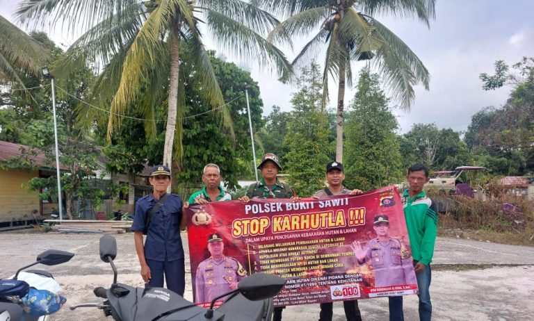 BHABINKAMTIBMAS POLSEK BUKIT SAWIT SOSIALISASIKAN LARANGAN KARHUTLA KEPADA WARGA