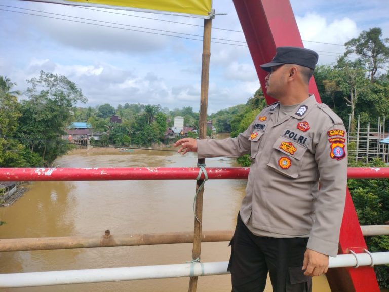 Cegah Bencana Sejak Dini, Polsek Manuhing Intensifkan Monitoring Titik Rawan Luapan Air